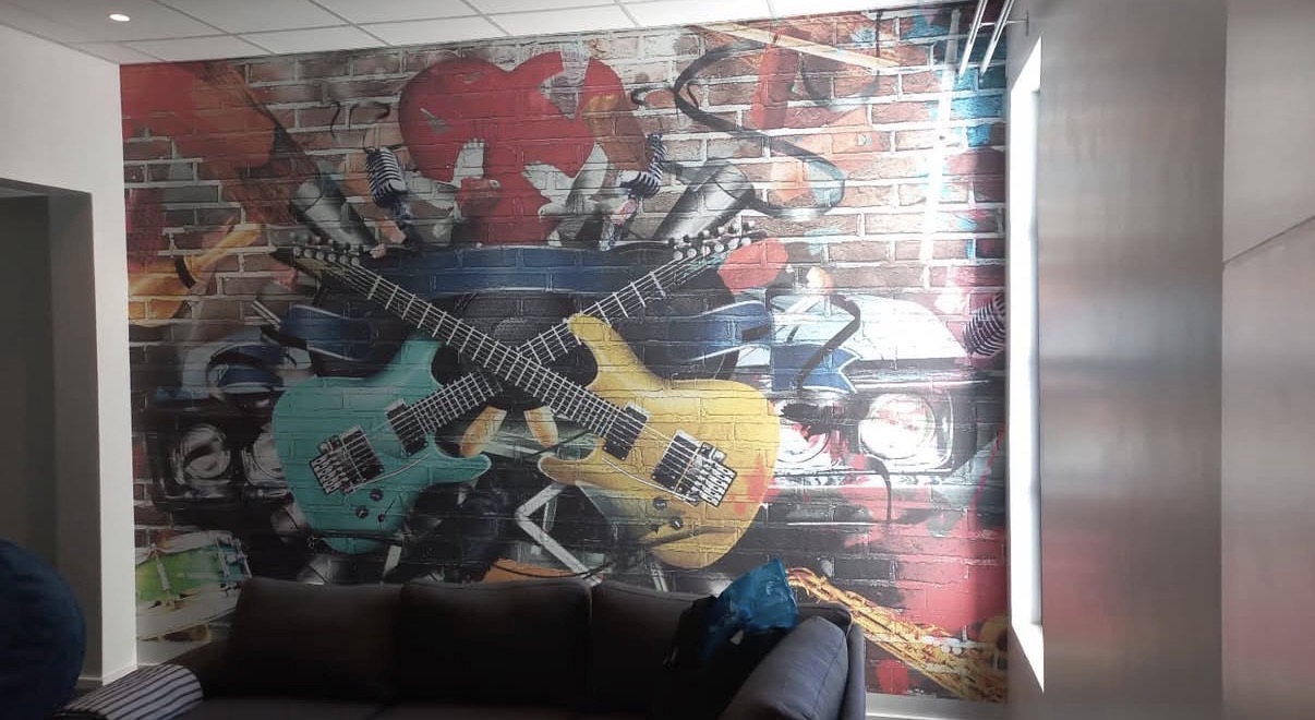 Custom wallpaper mural feature wall - Graffiti Guitars Lounge installation
