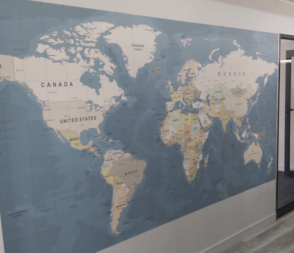 Custom wallpaper mural feature wall - Vintage World Map Wall installation